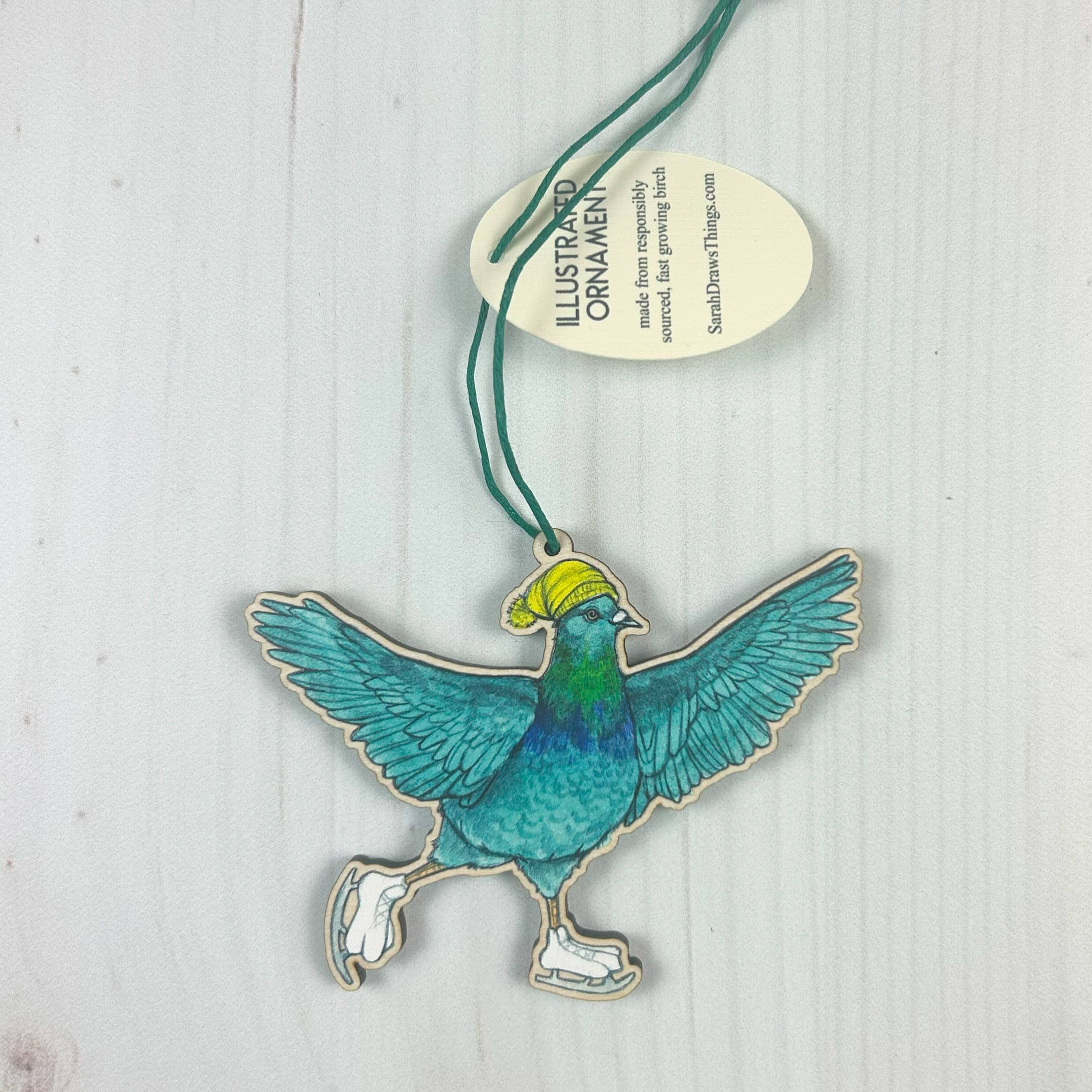 Pigeon Ice Skate - 3.5" illustrated wooden tree ornament - Image 1
