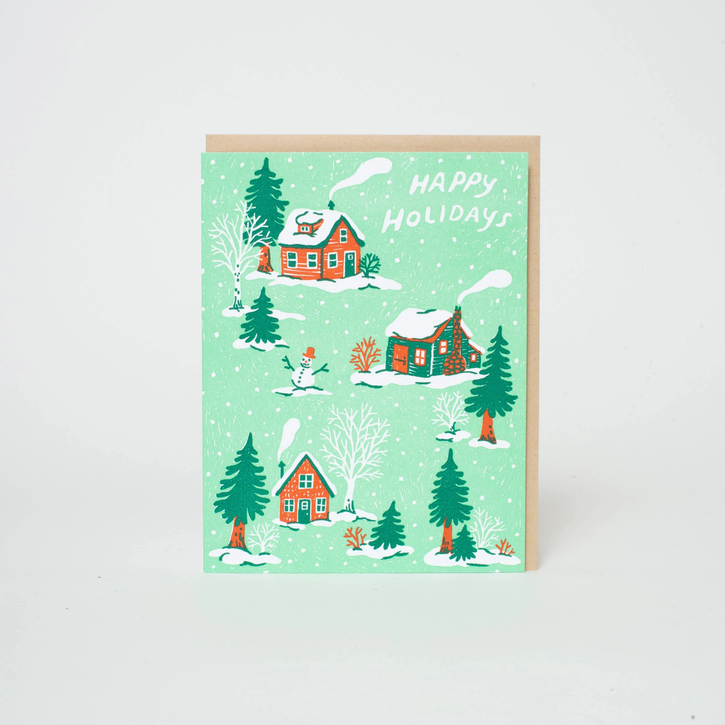 Christmas Cottages Letterpress Greeting Card by Phoebe Wahl - Image 1