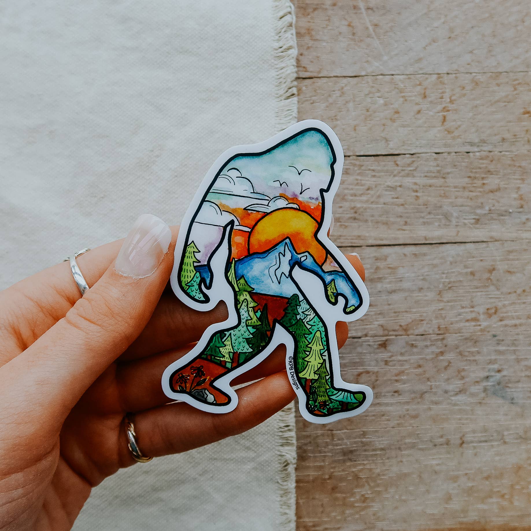 Sasquatch Sunset Vinyl Sticker (3x3in) - Image 1